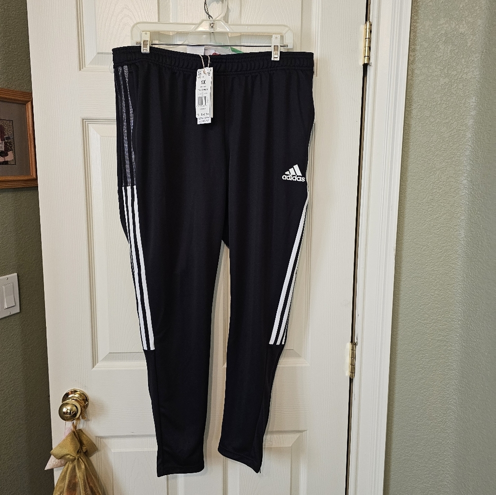 Adidas NWT Tiro pants. Non-smoking home. Nice workout or atheleisure pants.